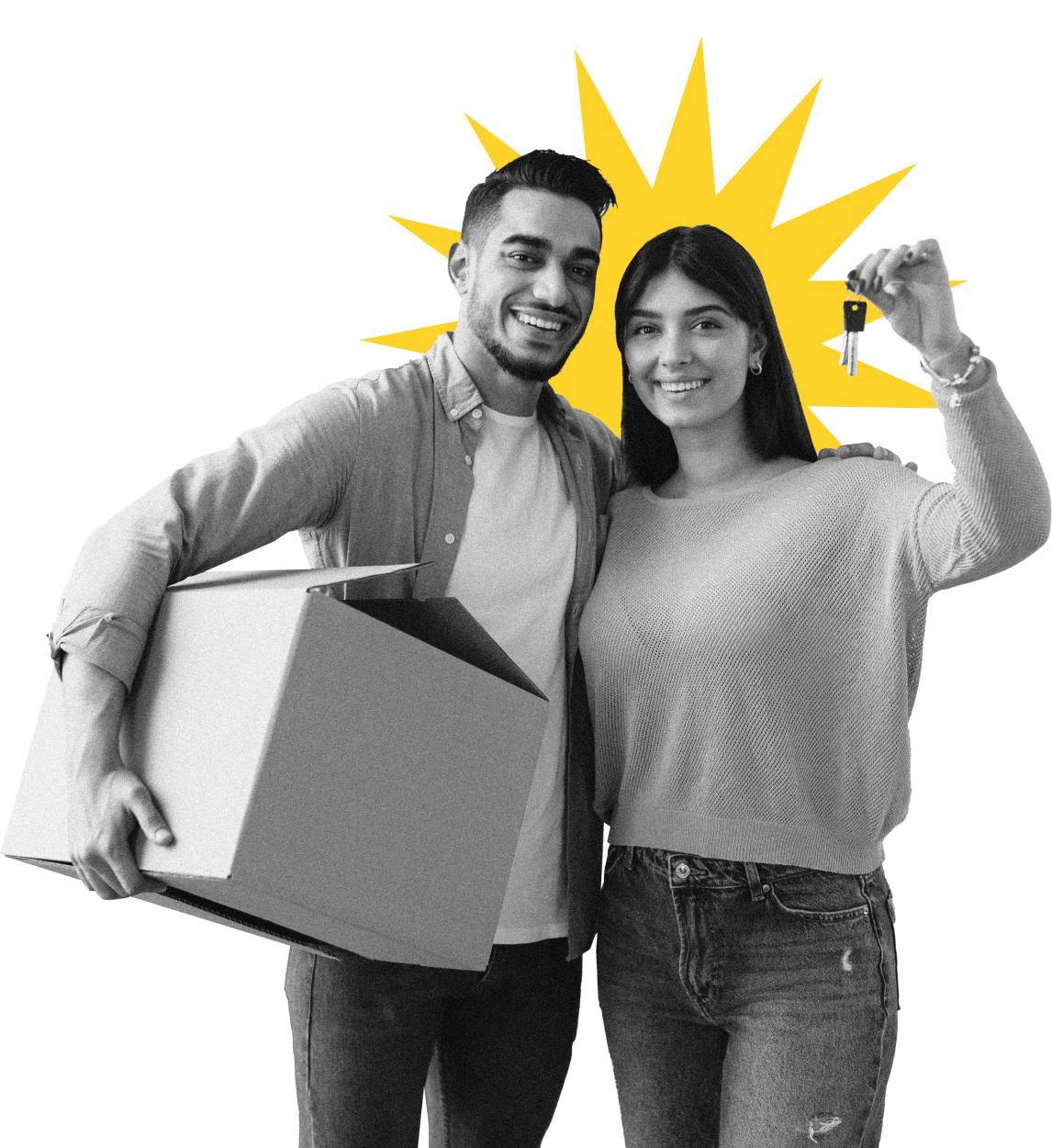 People smiling with house keys
