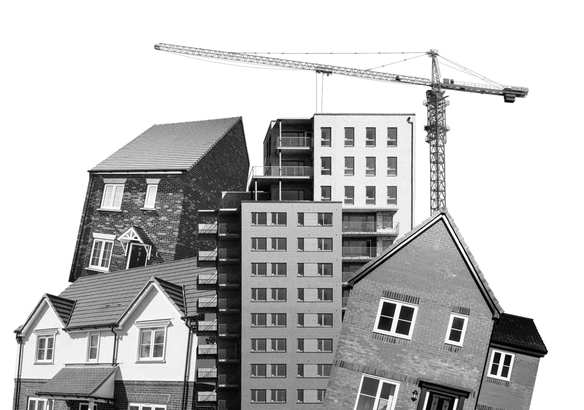 A mix of new-build houses and flats with a construction crane